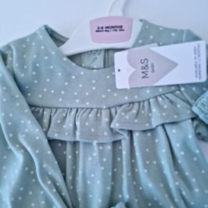 Green spotted sleepsuits